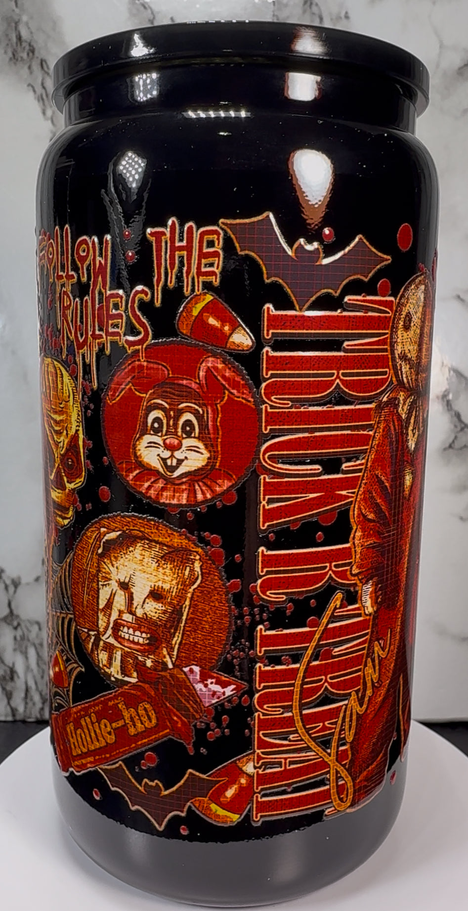 Trick R Treat Sam UVDTF on a black beer can glass