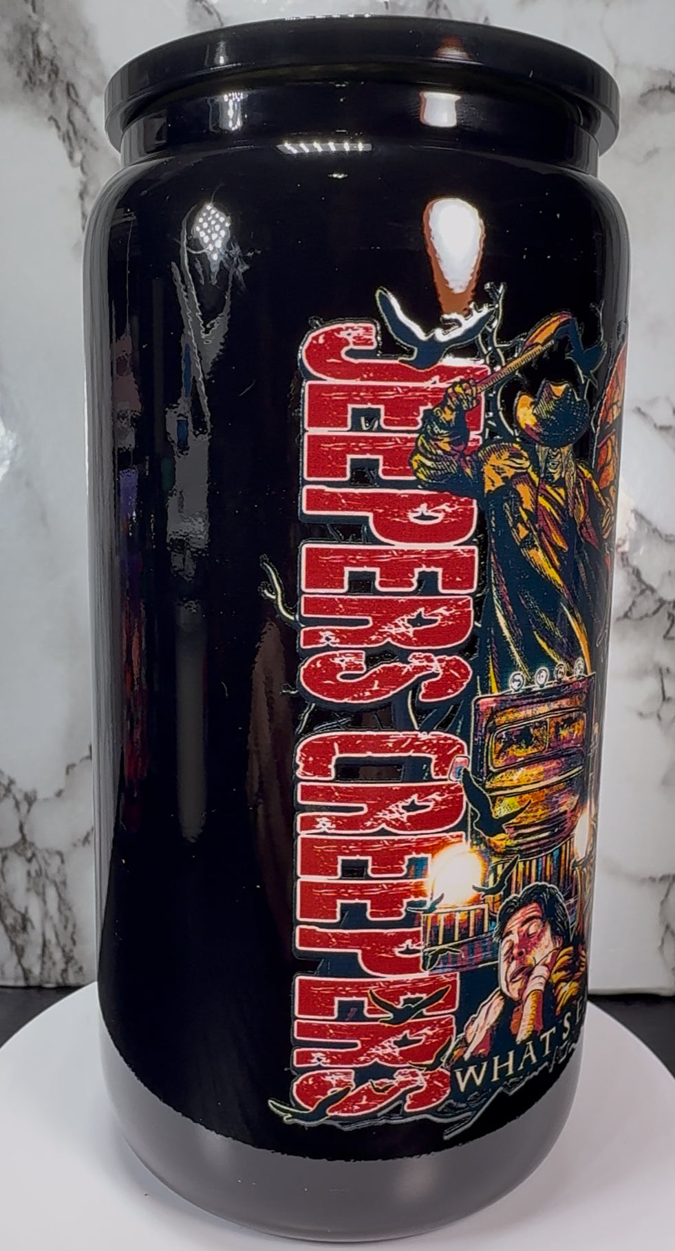 Jeepers Creepers UVDTF on a black beer can glass