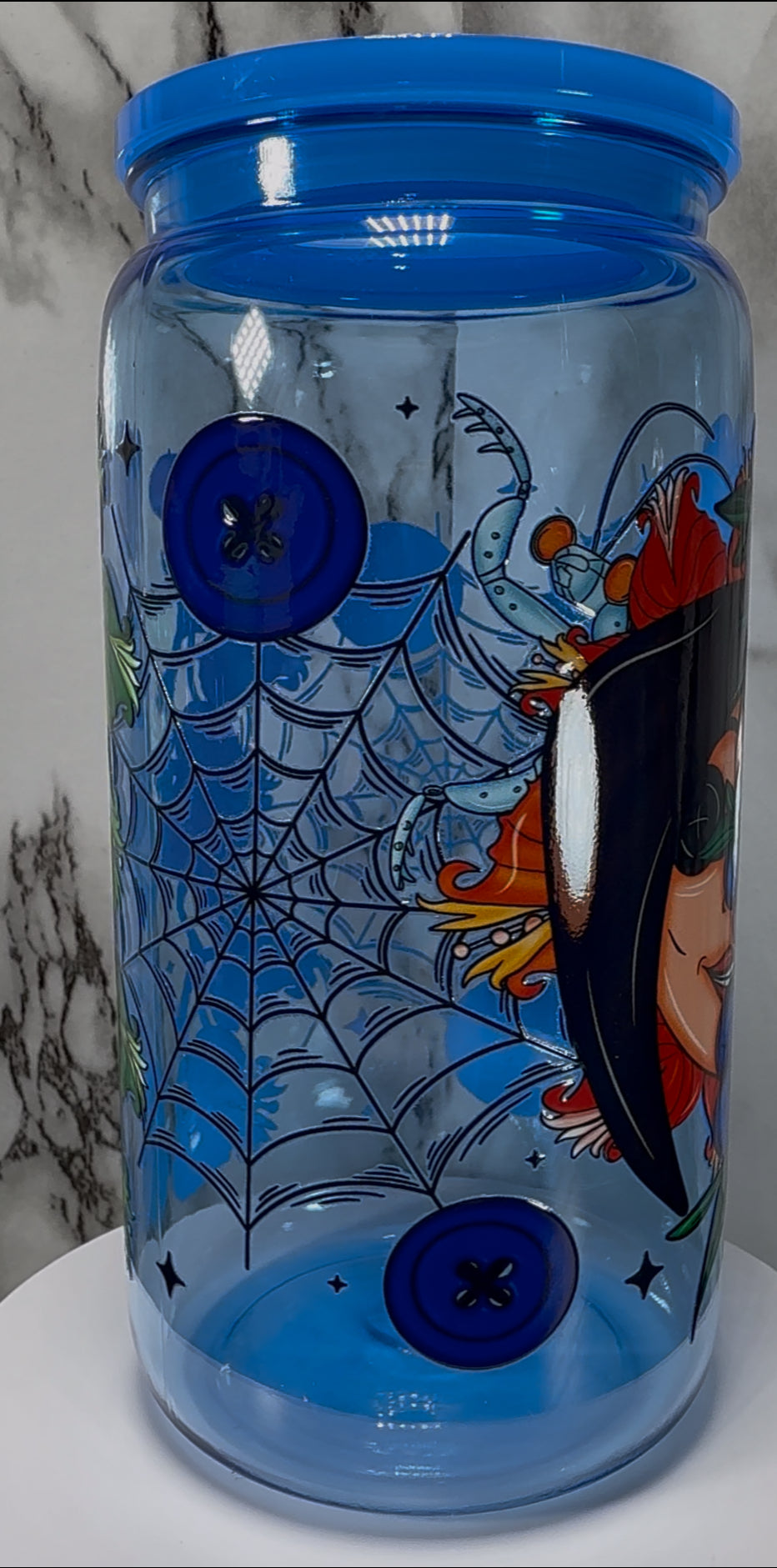 Coraline Other Mother UVDTF on a blue PLASTIC beer can cup