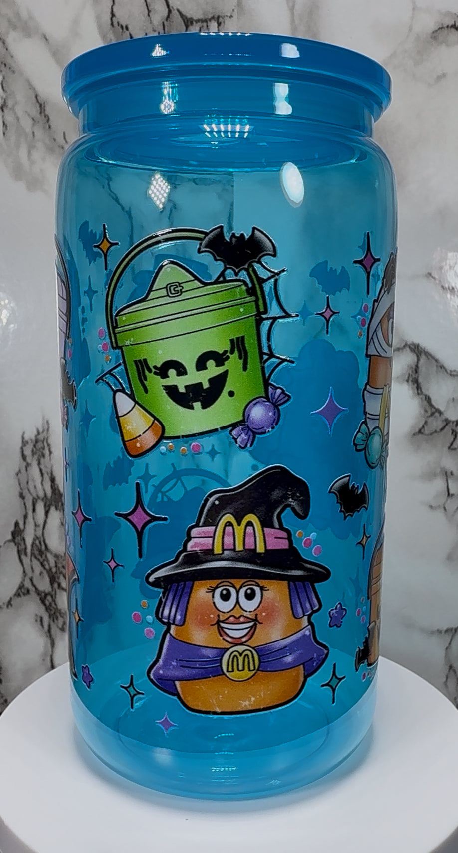 Old skool McDonald’s Halloween chicken nuggets and pail buckets UVDTF on a bright blue PLASTIC beer can cup
