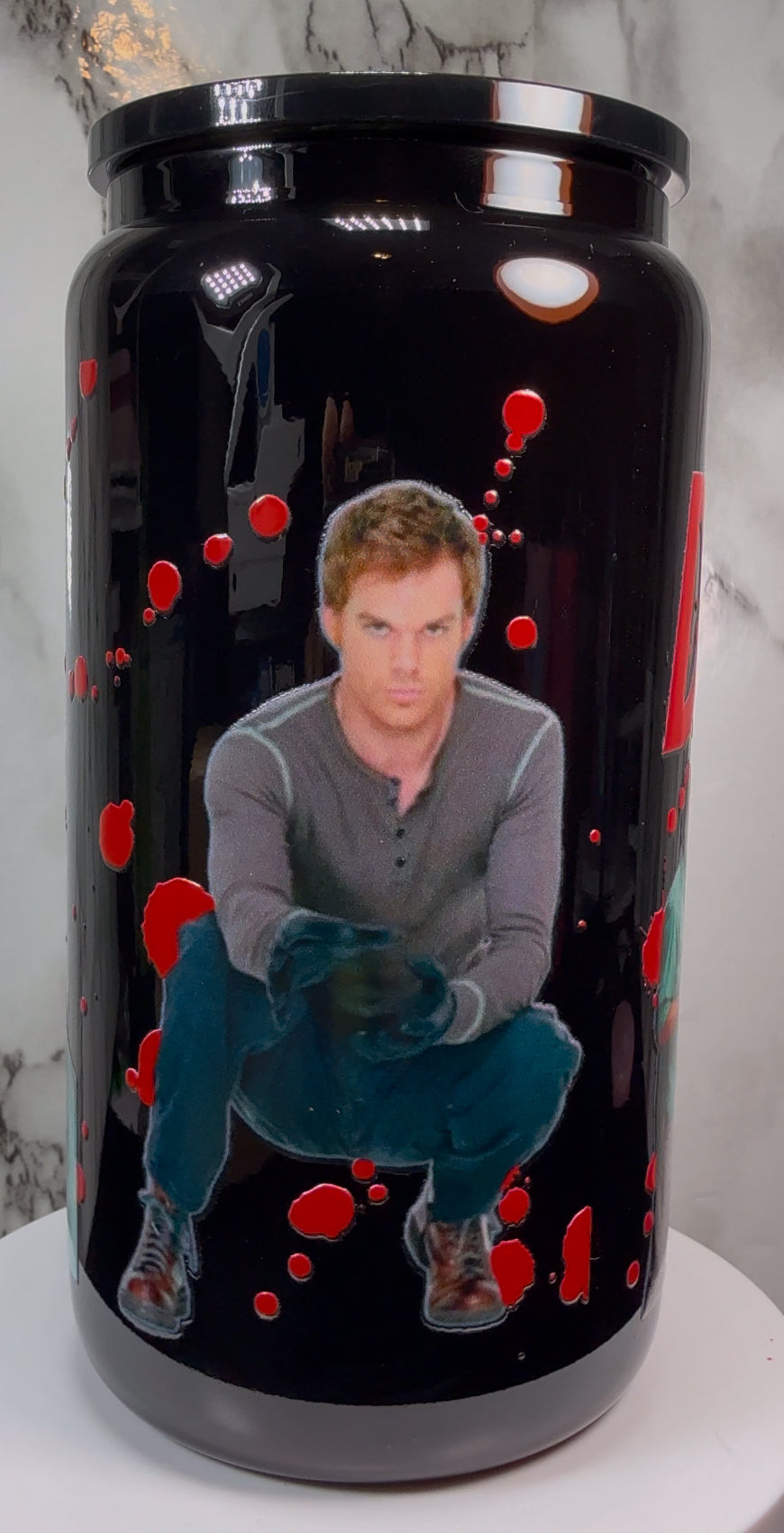 Dexter UVDTF on a black beer can glass