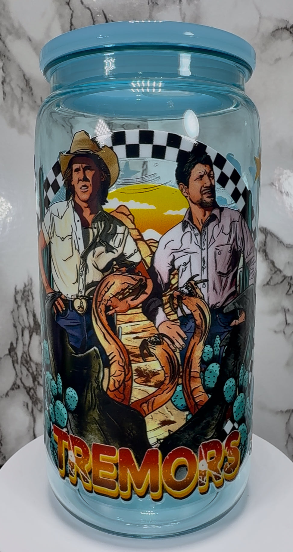 Tremors UVDTF on a light blue PLASTIC beer can cup