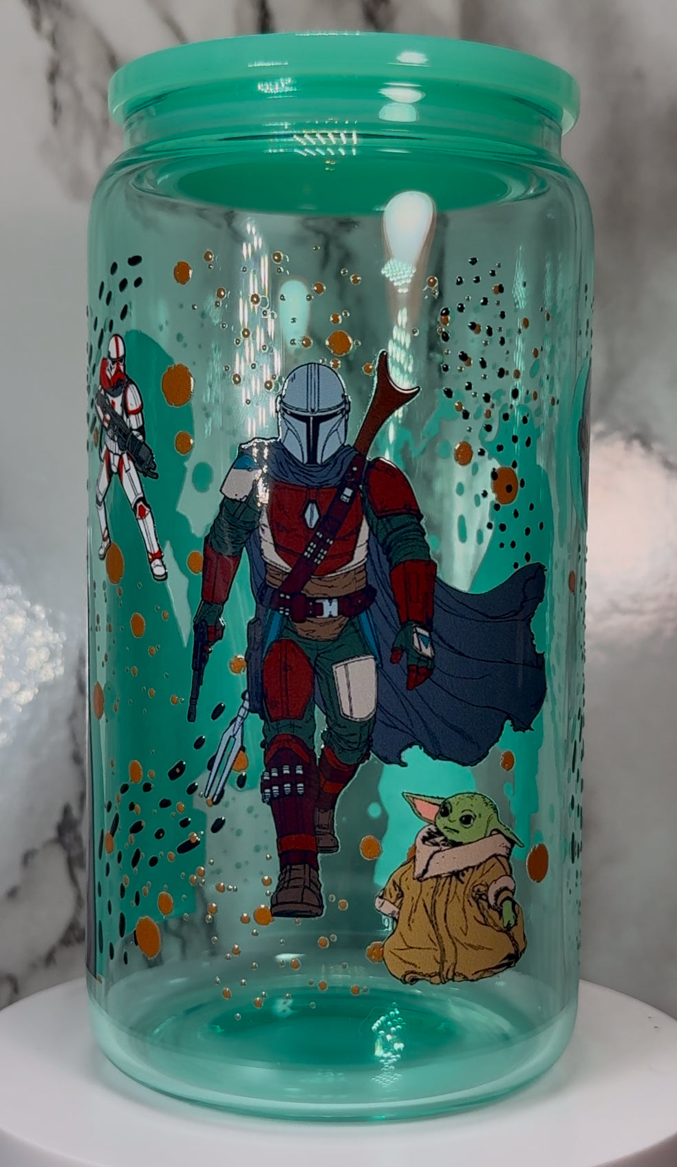 Mandalorian & Grogu Star Wars UVDTF on a teal beer can glass