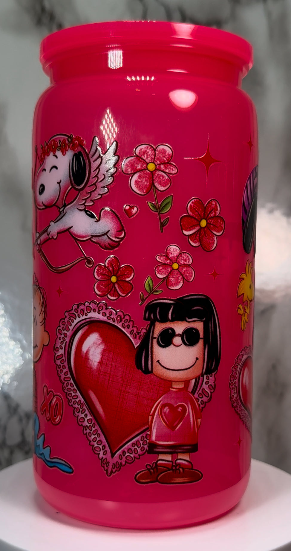 Charlie Brown Valentine’s Day UVDTF on a plastic hot pink beer can cup