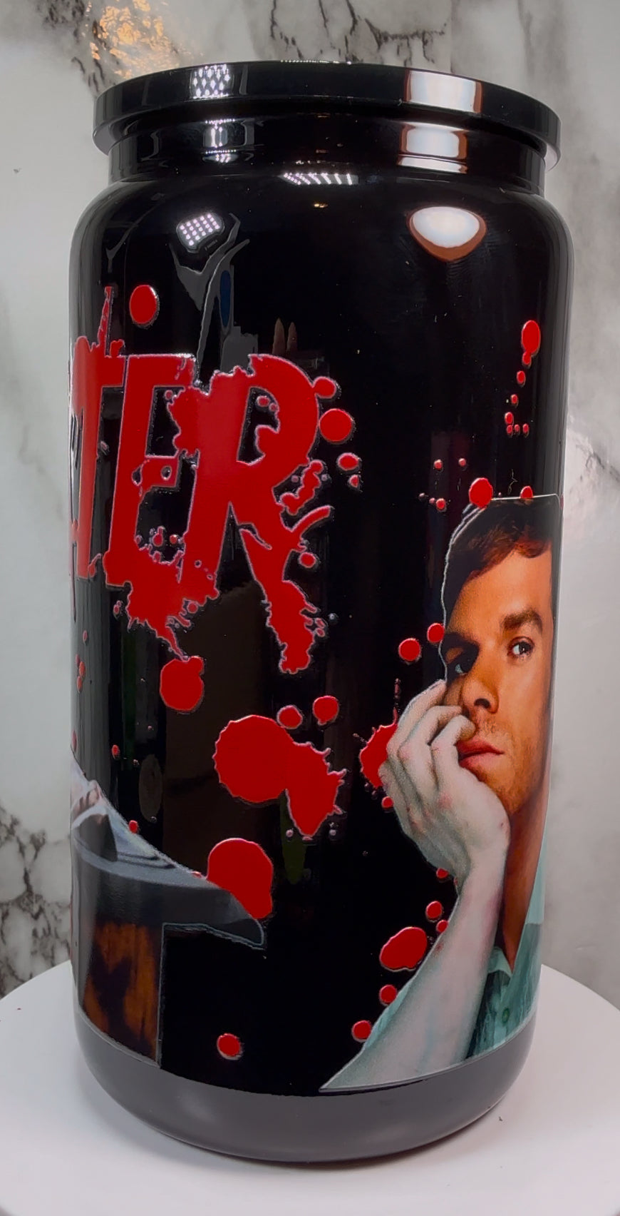 Dexter UVDTF on a black beer can glass