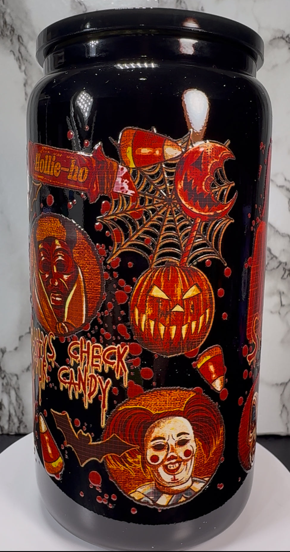 Trick R Treat Sam UVDTF on a black beer can glass