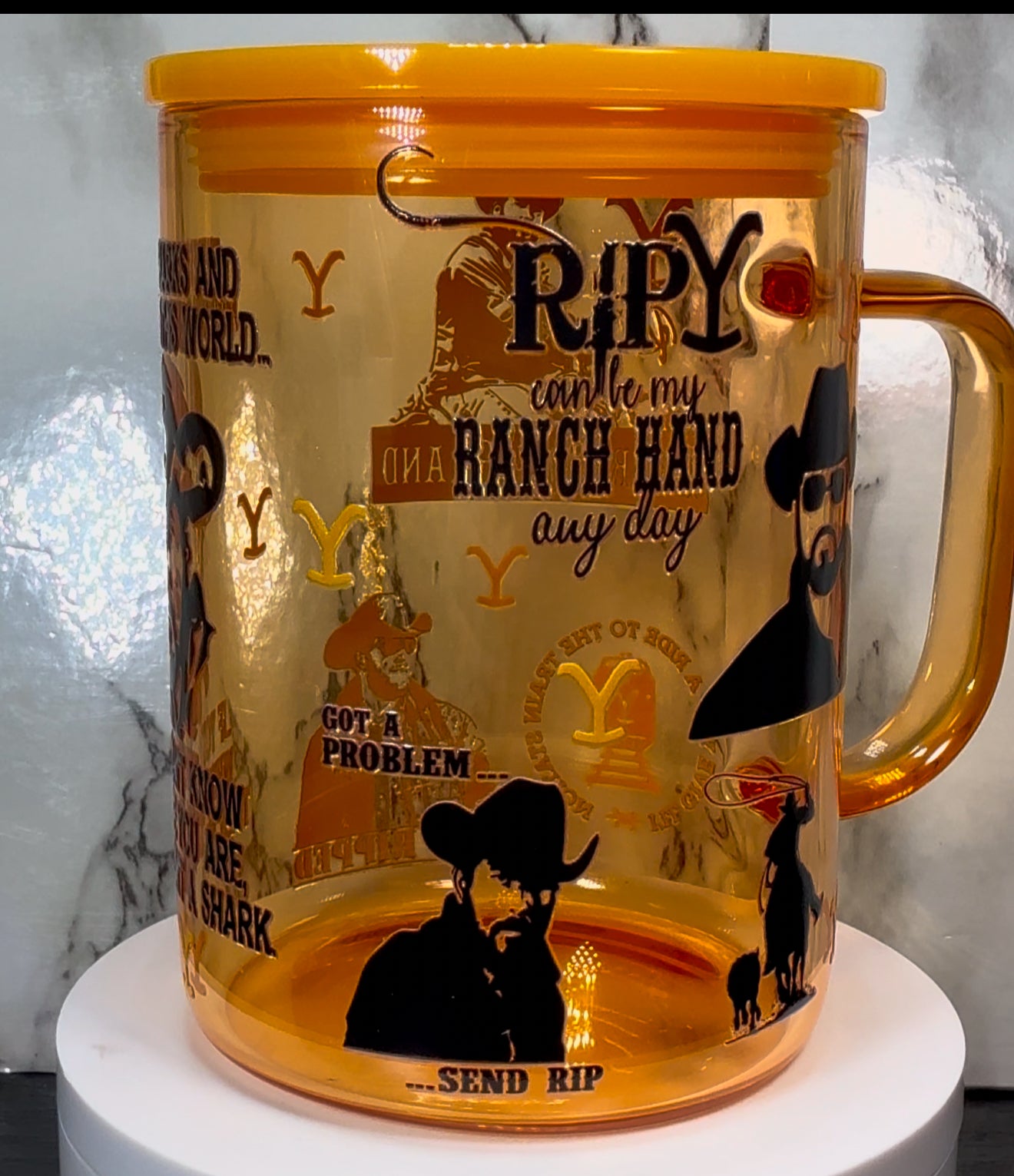 Yellowstone Rip UVDTF on a yellow 17oz glass mug