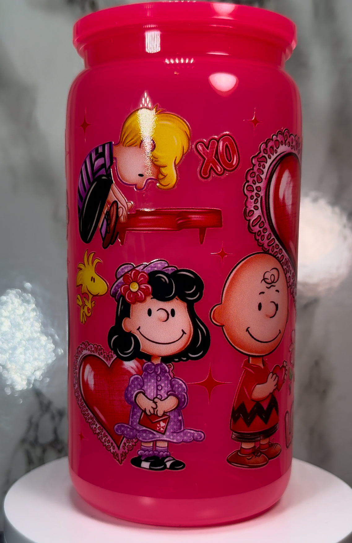 Charlie Brown Valentine’s Day UVDTF on a plastic hot pink beer can cup