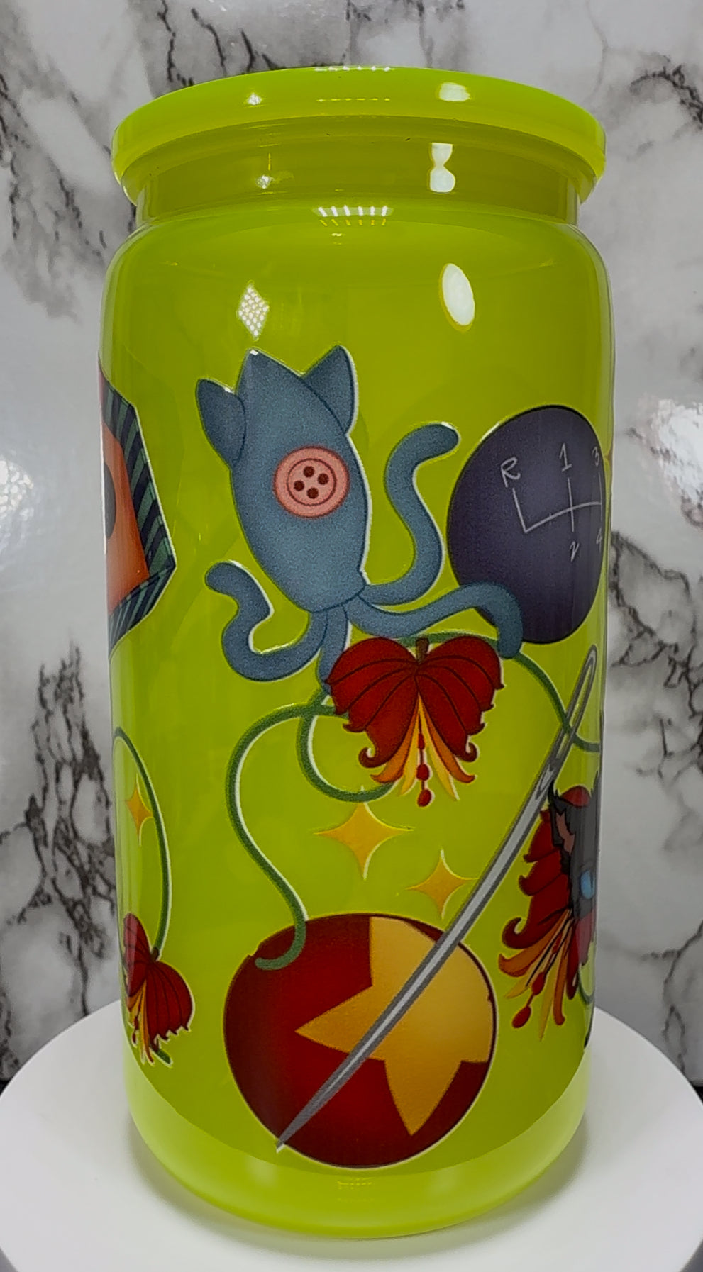 Little Coraline on a bright yellow PLASTIC beer can cup