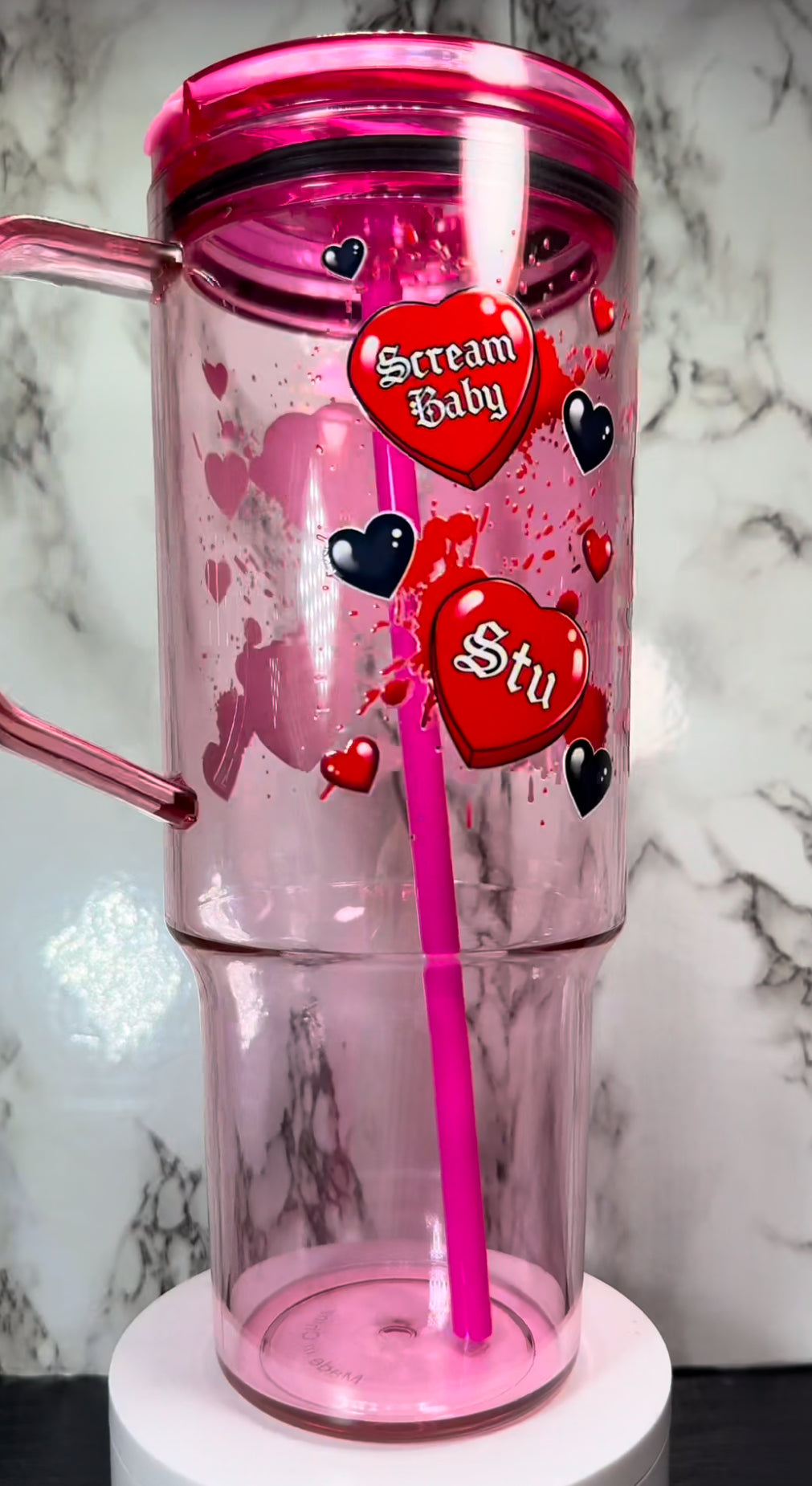 Valentine’s Day Stu Macher UVDTF on a 40oz pink acrylic tumbler