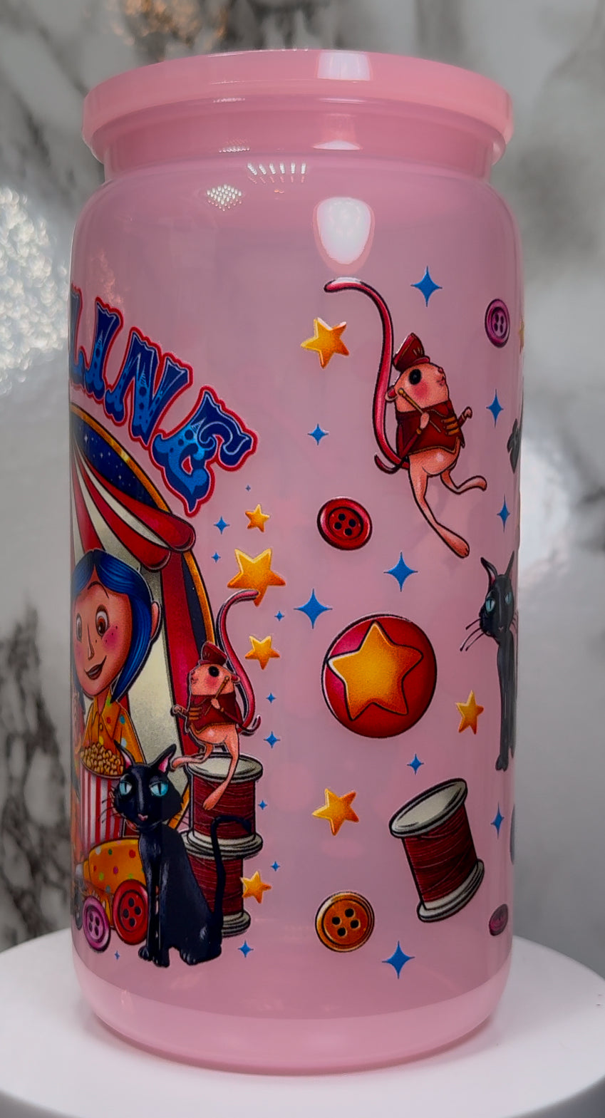 Coraline Circus UVDTF on a PLASTIC pink beer can cup