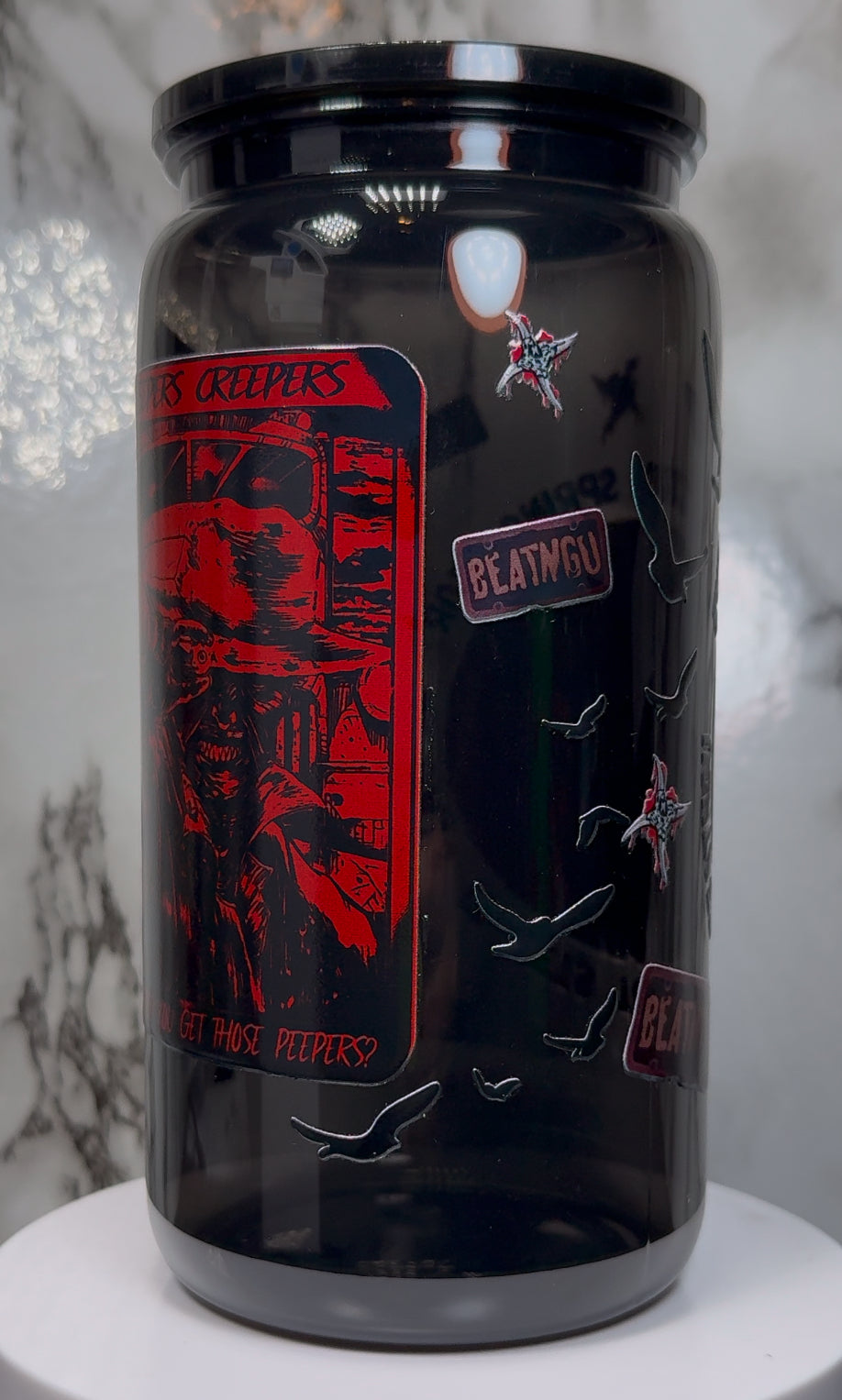 Jeepers Creepers UVDTF on a PLASTIC black beer can cup
