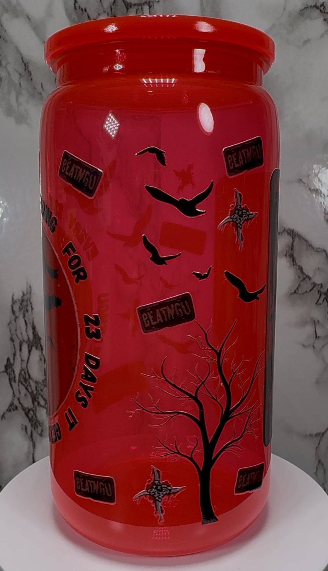 Jeepers Creepers UVDTF on a bright red PLASTIC beer can cup