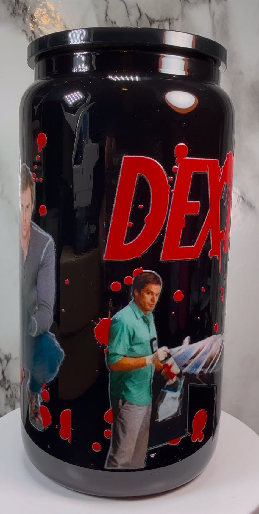 Dexter UVDTF on a black beer can glass