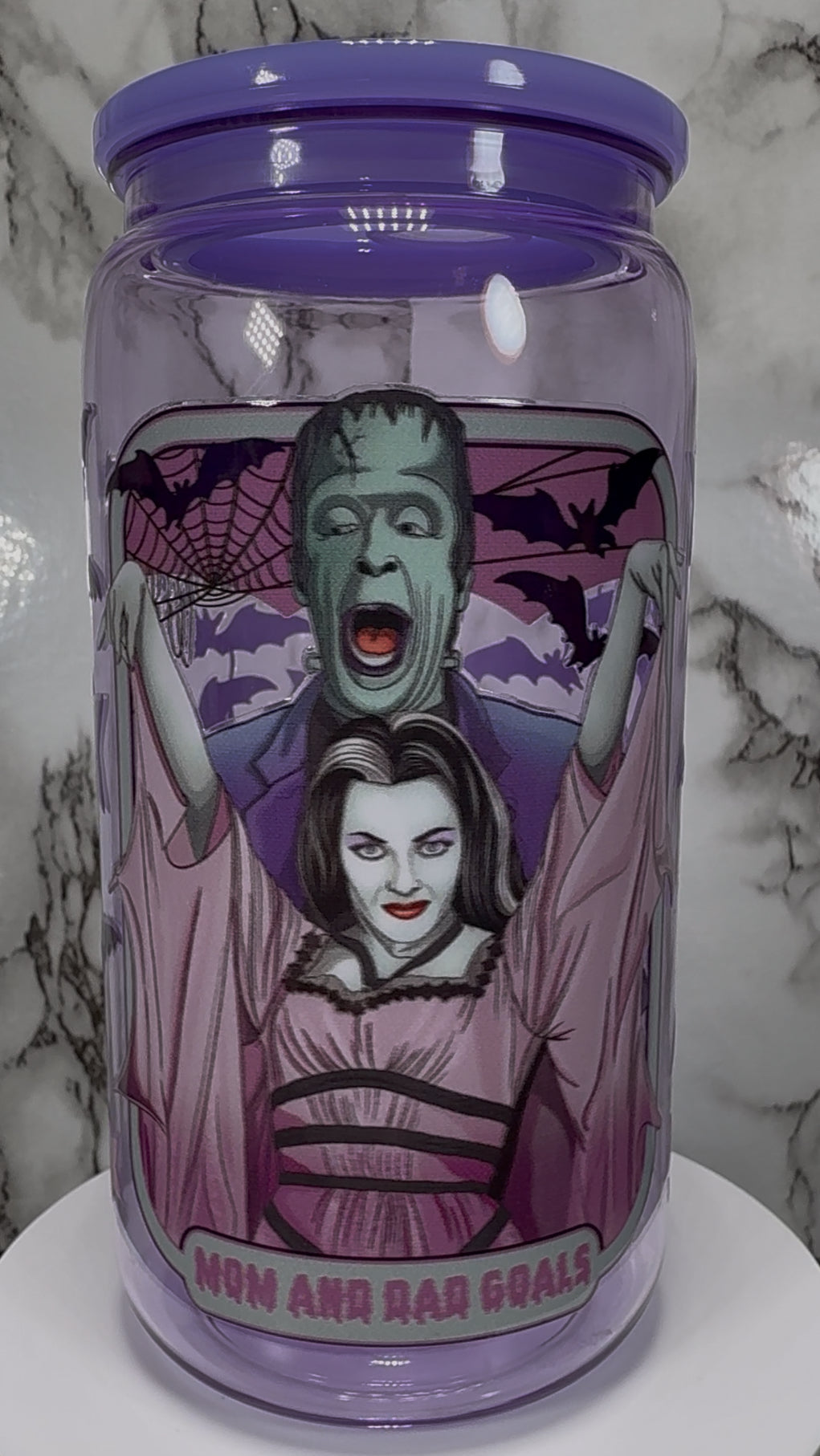 The Munsters Mom and Dad Goals UVDTF on a PLASTIC purple beer can cup