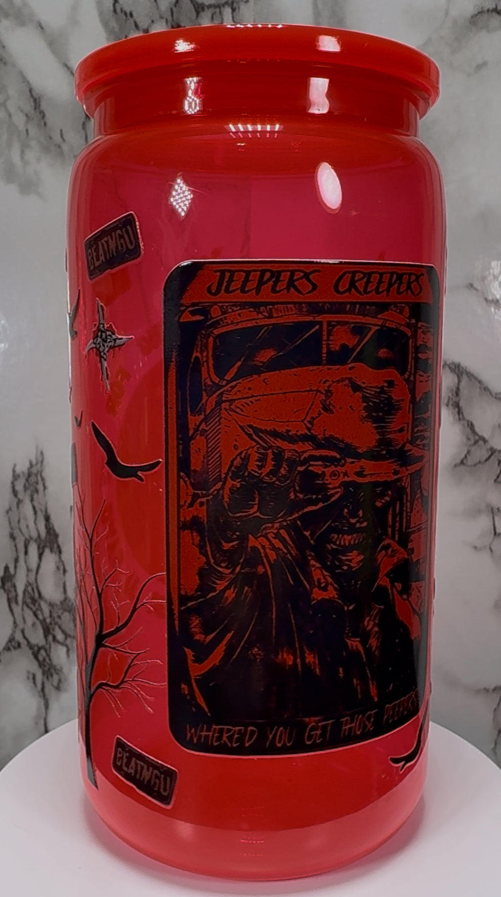 Jeepers Creepers UVDTF on a bright red PLASTIC beer can cup