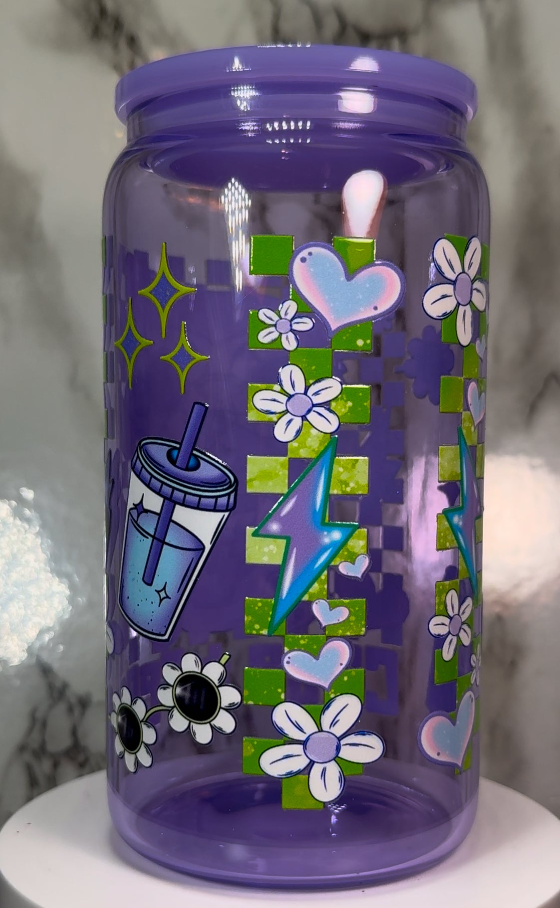 Cute & Feral Raccoon UVDTF on a purple beer can glass