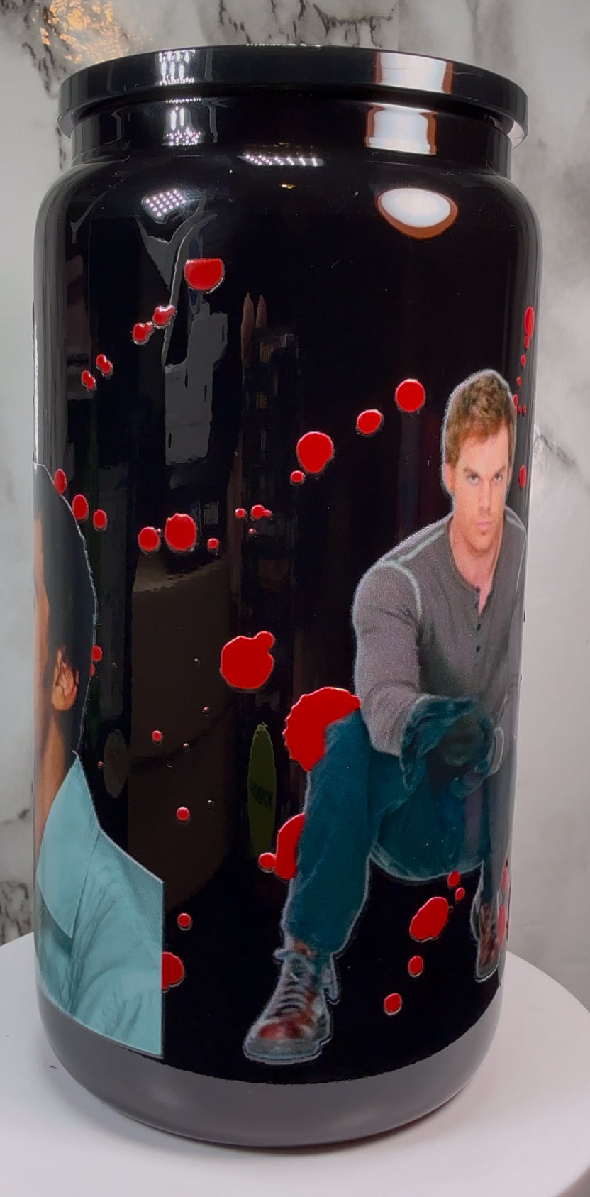Dexter UVDTF on a black beer can glass