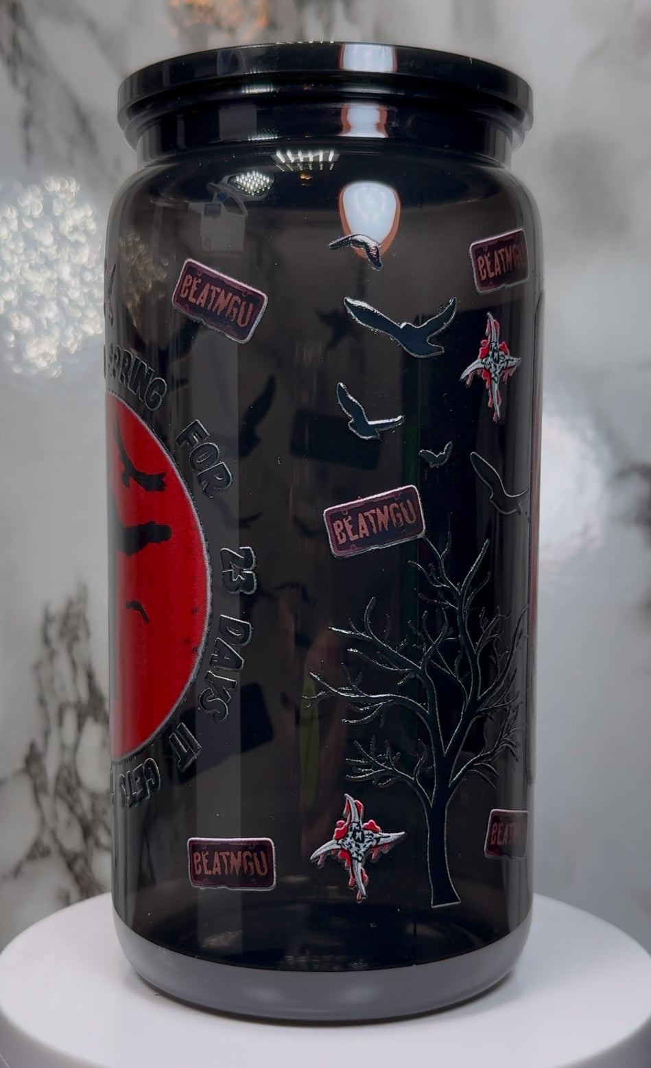 Jeepers Creepers UVDTF on a PLASTIC black beer can cup