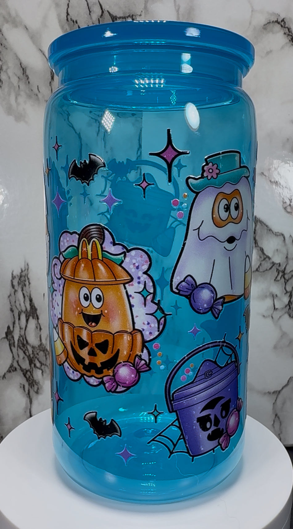 Old skool McDonald’s Halloween chicken nuggets and pail buckets UVDTF on a bright blue PLASTIC beer can cup