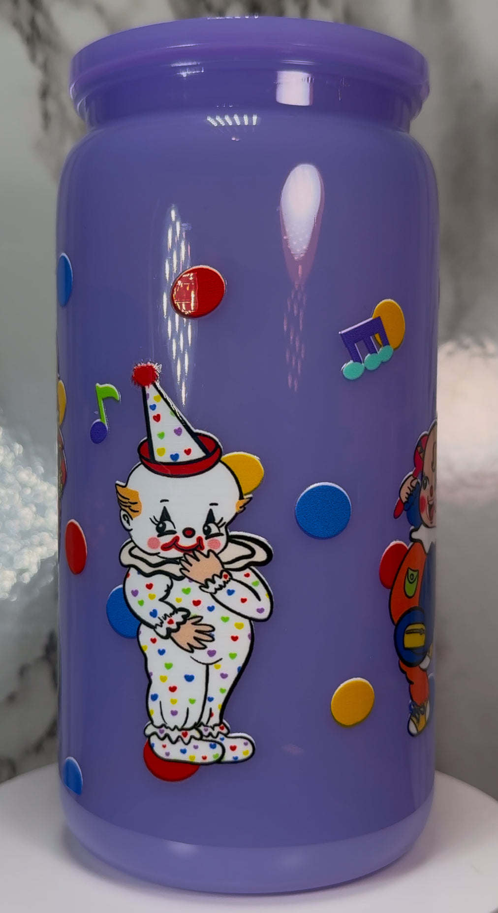 Classic Vintage Circus Clowns UVDTF on a plastic purple cup