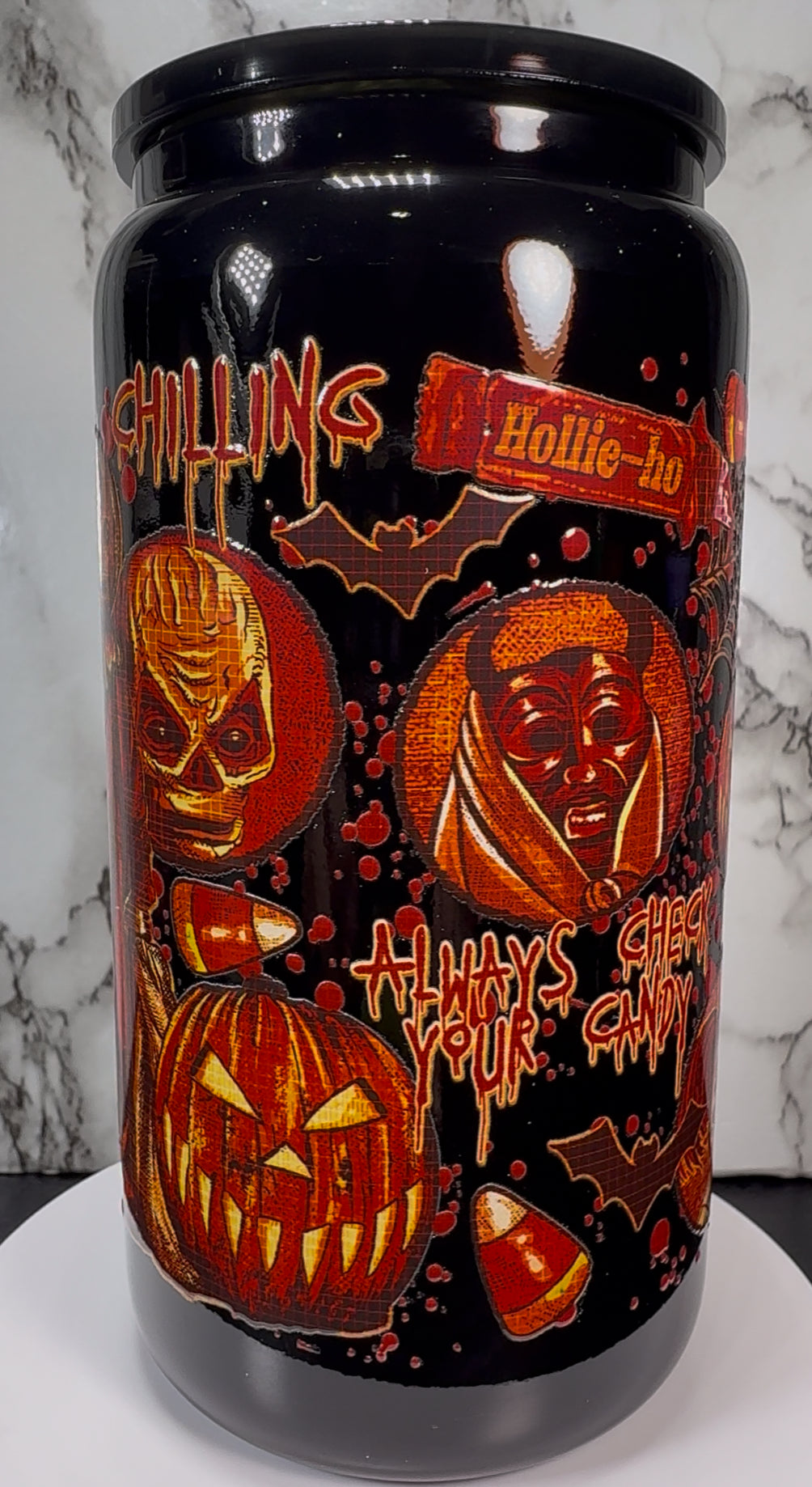 Trick R Treat Sam UVDTF on a black beer can glass