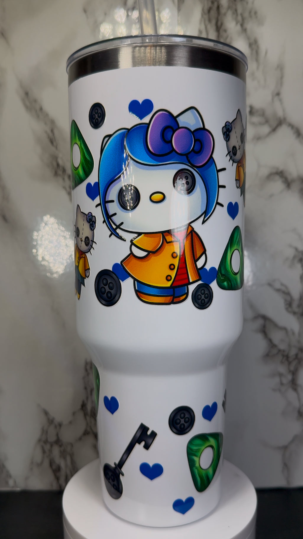 Hello Kitty Coraline UVDTF on a 40 oz white tumbler