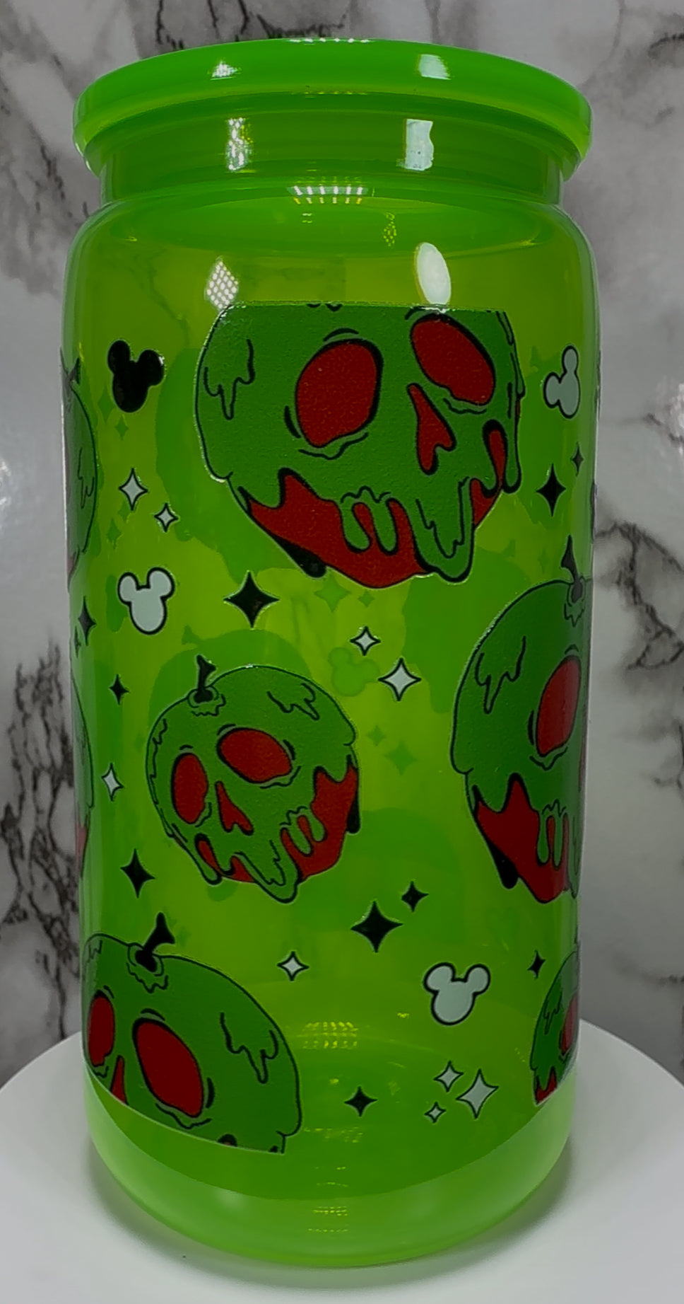 Snow White’s Poison Apple UVDTF on a bright green PLASTIC beer can cup