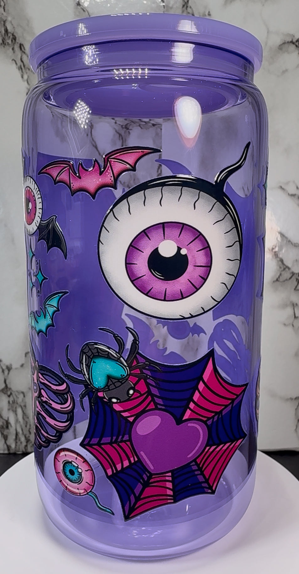 Elvira UVDTF on a purple beer can glass