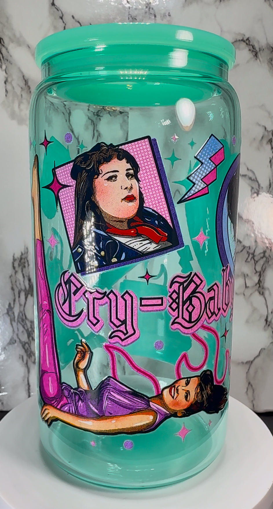 Cry Baby UVDTF on a teal beer can glass