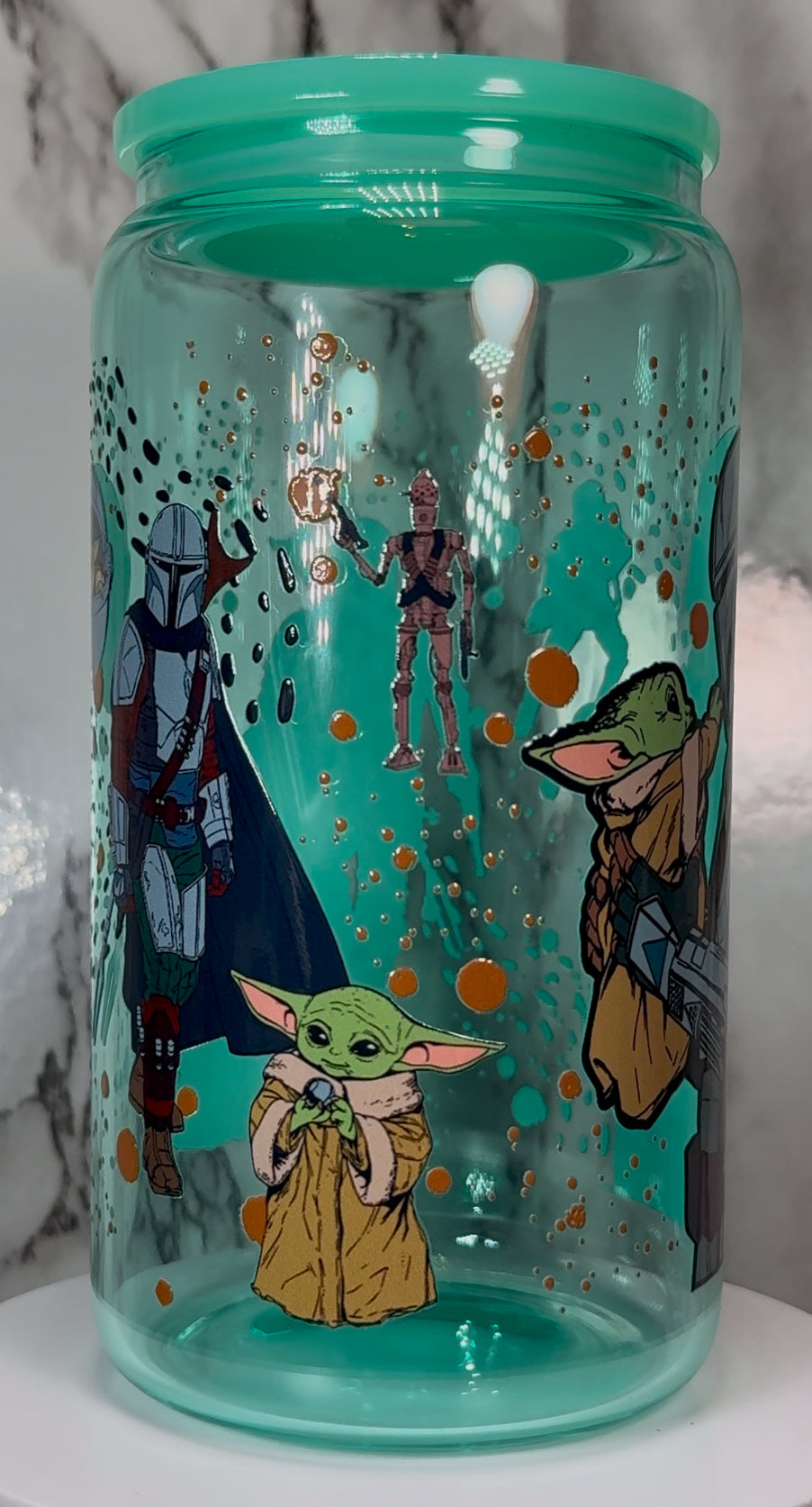 Mandalorian & Grogu Star Wars UVDTF on a teal beer can glass