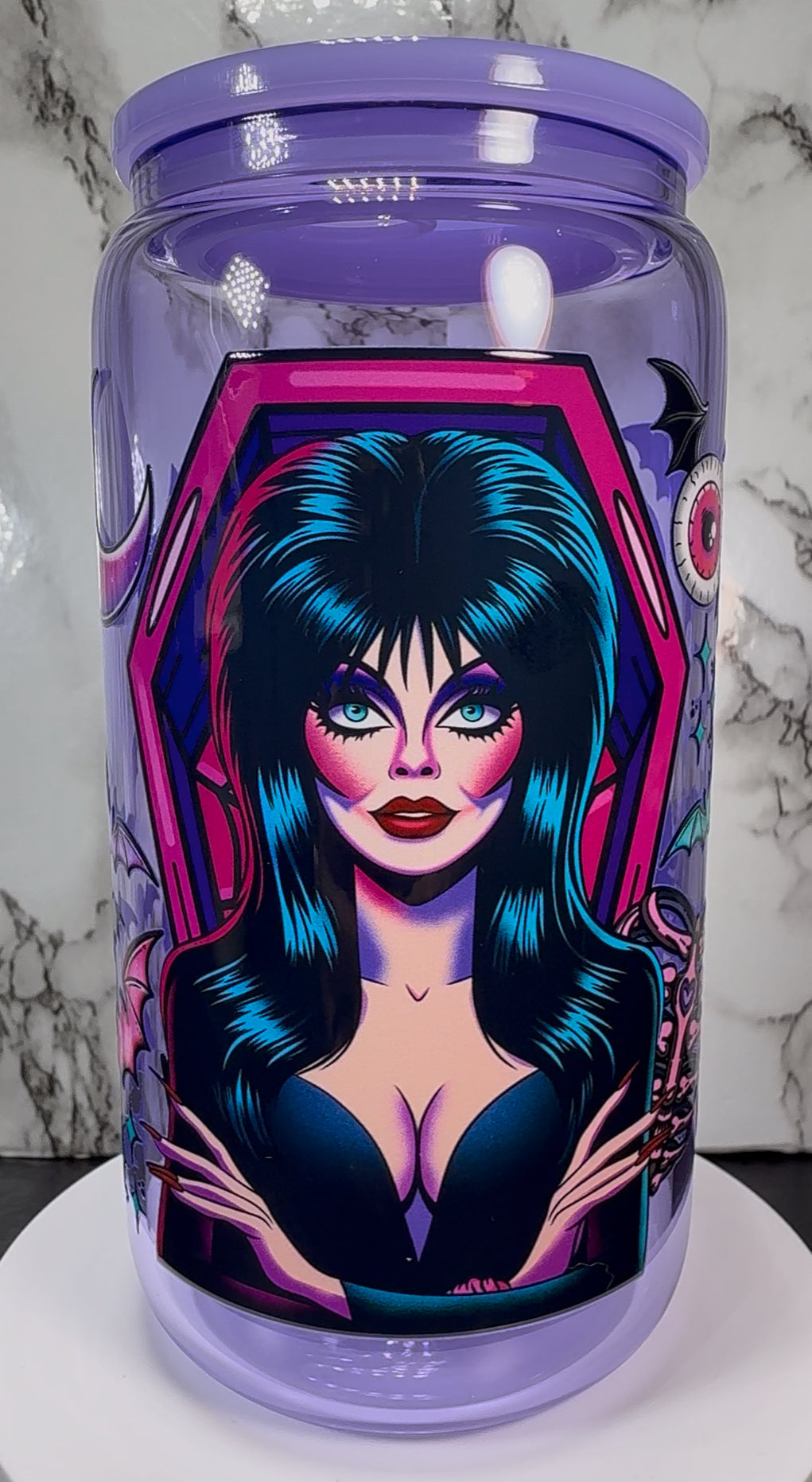 Elvira UVDTF on a purple beer can glass