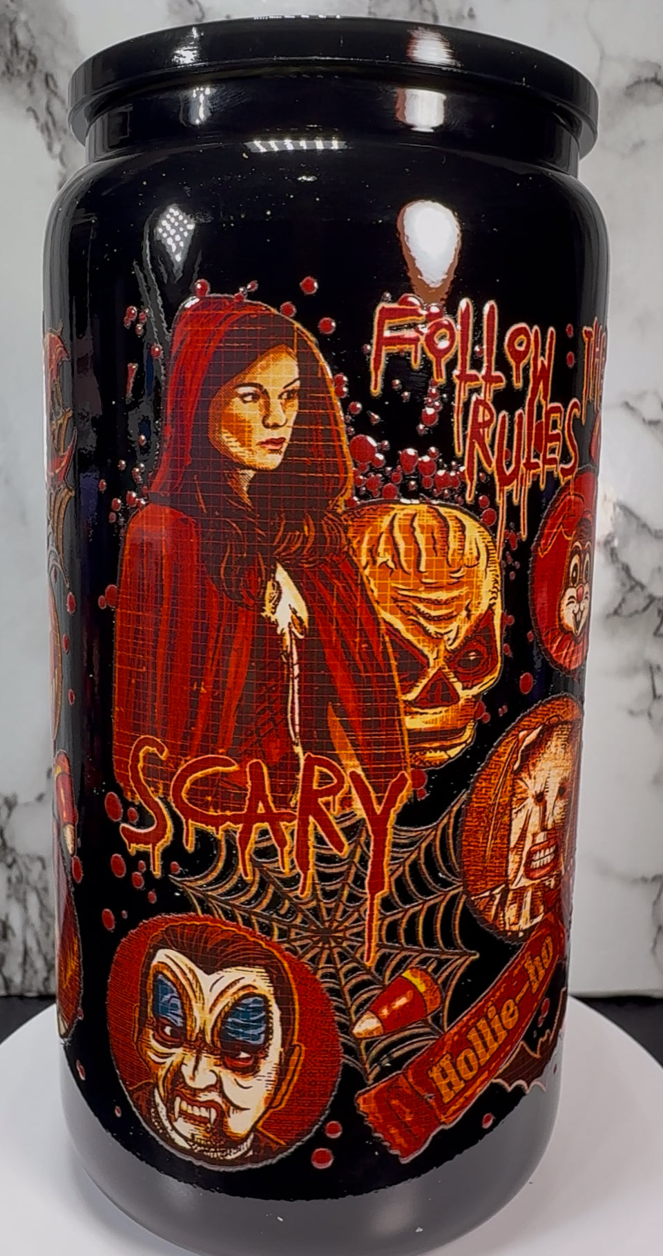 Trick R Treat Sam UVDTF on a black beer can glass