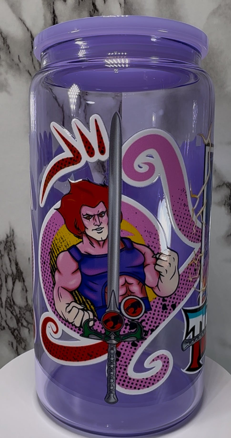 Thundercats UVDTF on a purple beer can glass