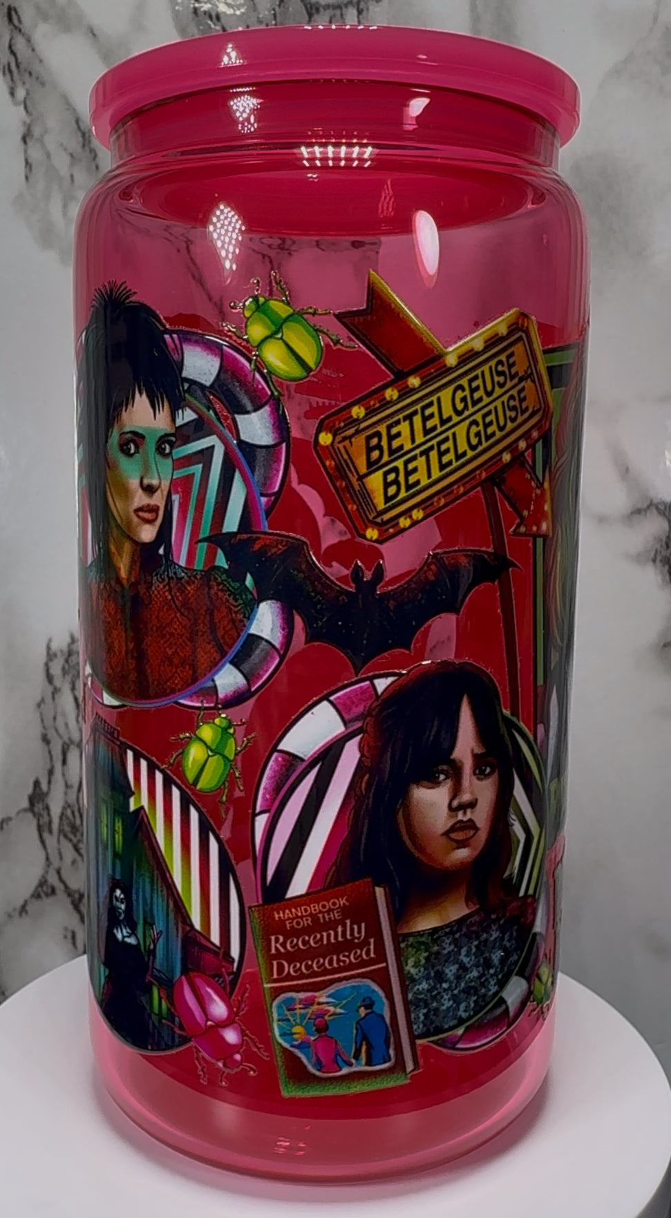 Beetlejuice UVDTF on a hot pink beer can glass