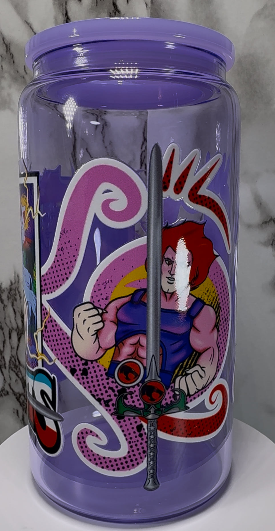 Thundercats UVDTF on a purple beer can glass