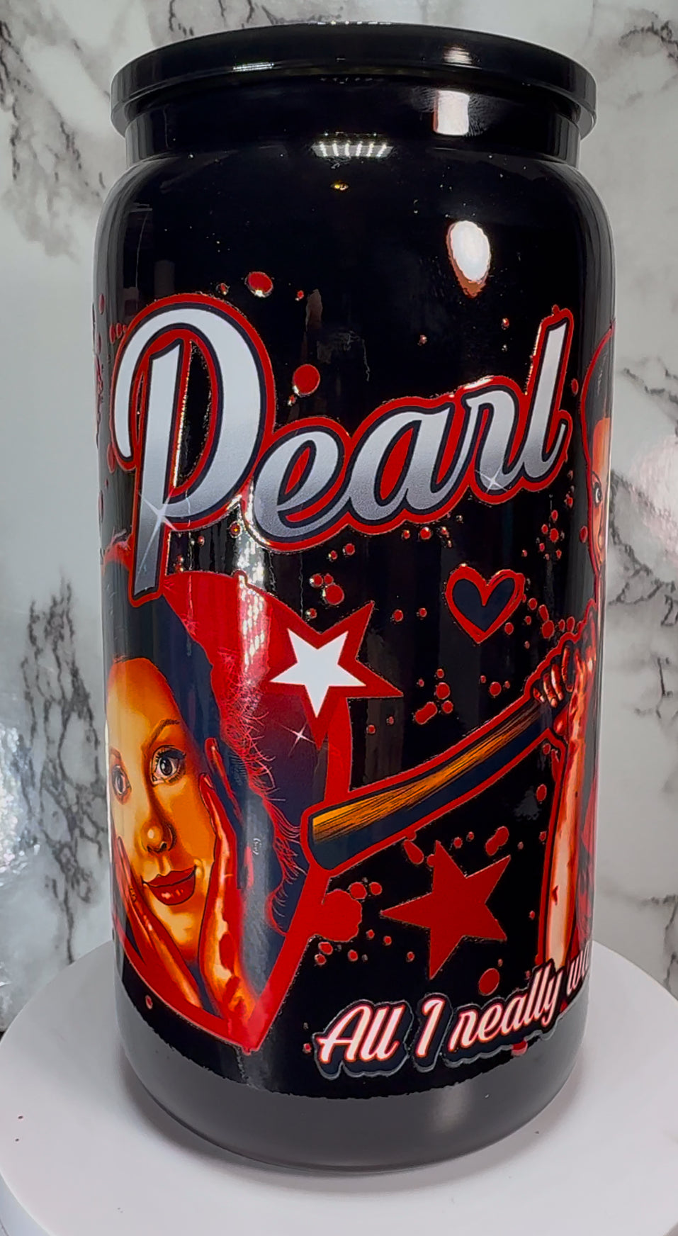 Pearl UVDTF on a black beer can glass