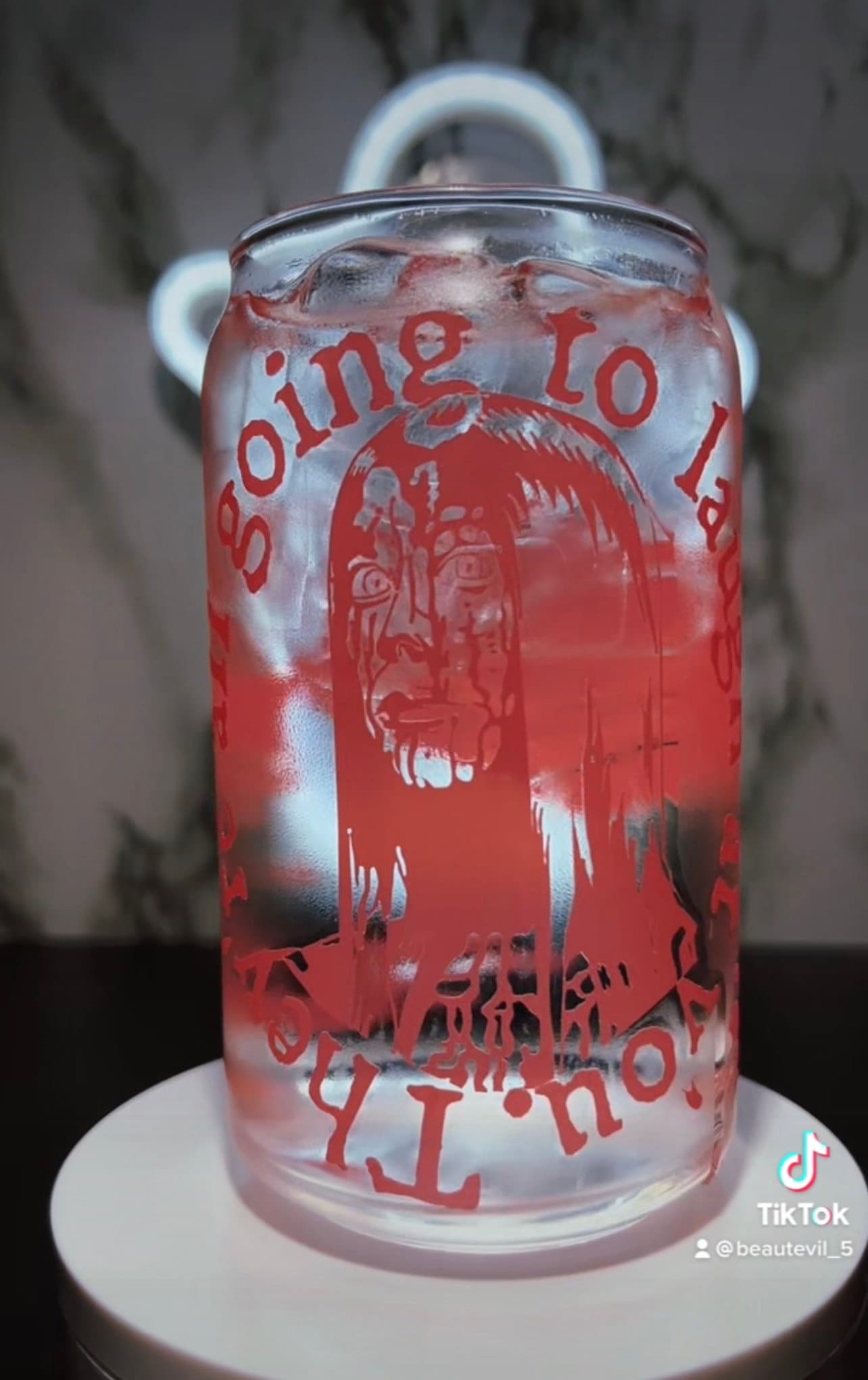 Carrie White color changing red permanent vinyl on a libbey beer can glass