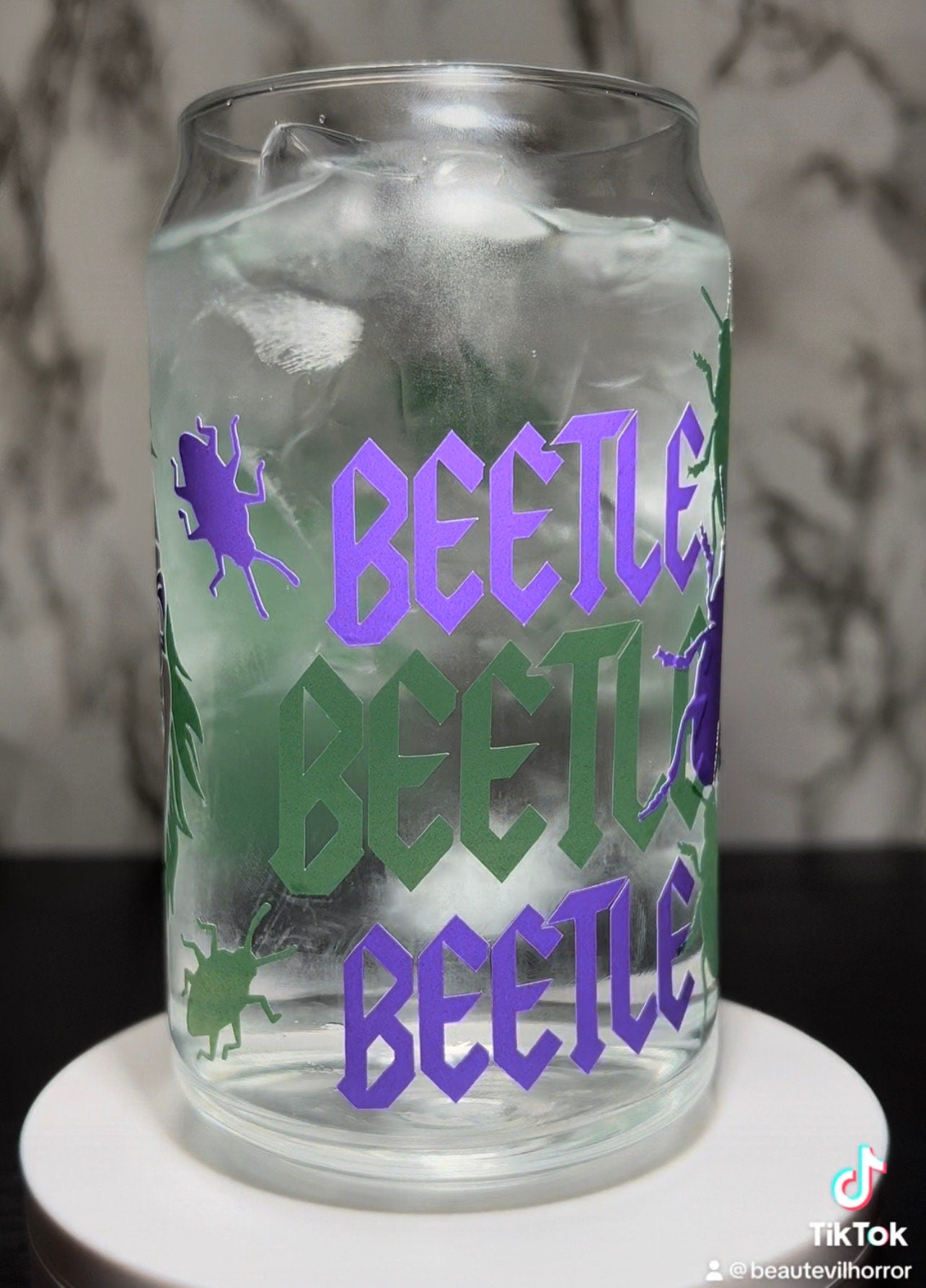 Beetlejuice color changing permanent vinyl on a libbey beer can glass