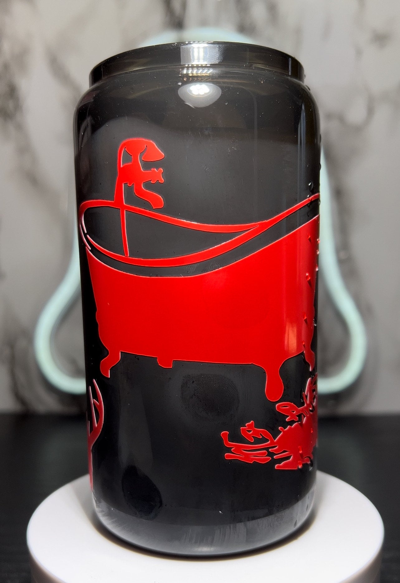 Saltburn color changing permanent vinyl on a all black beer can glass