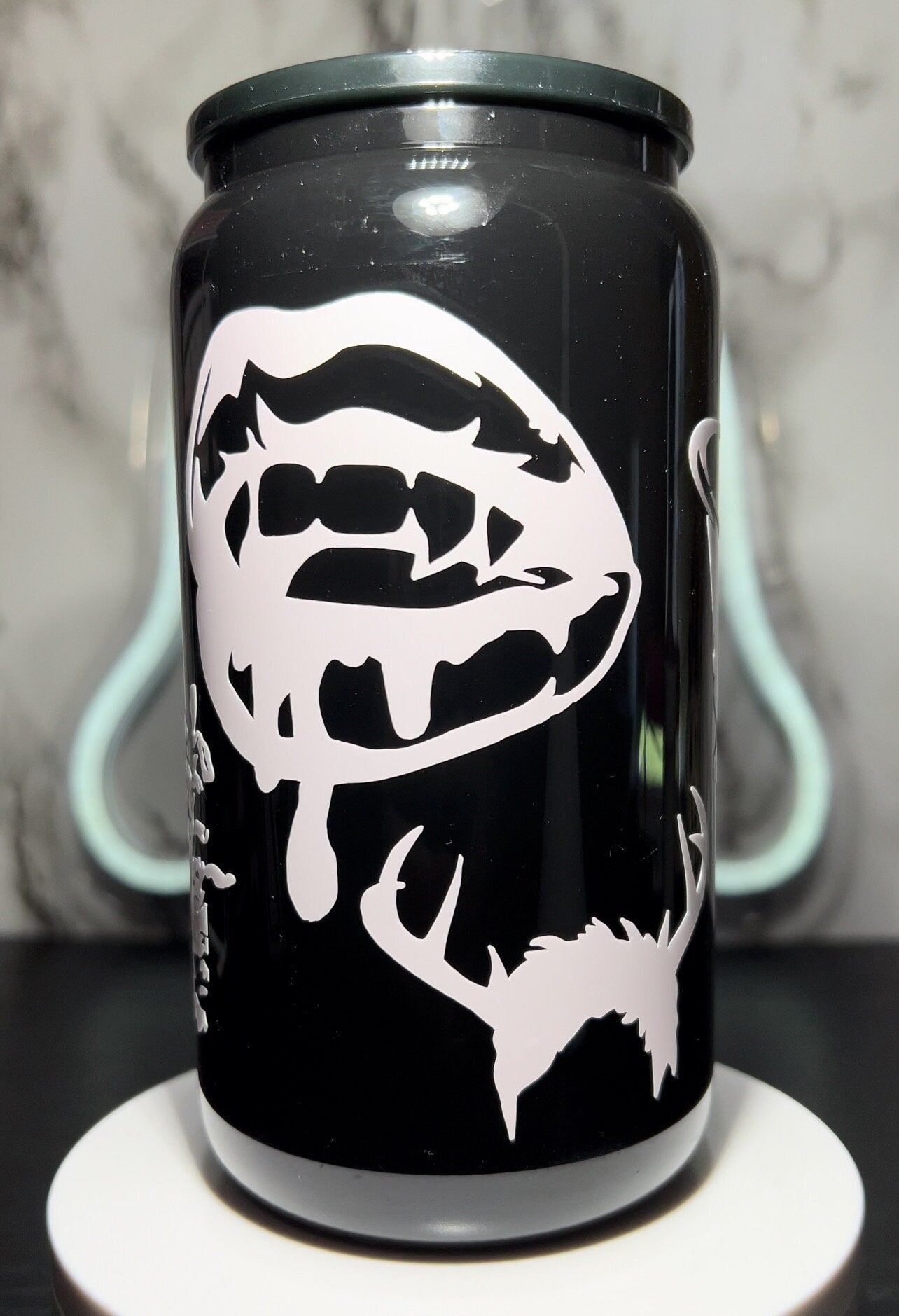 Saltburn color changing permanent vinyl on a all black beer can glass