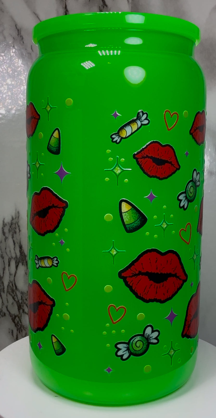 Greta Gremlin UVDTF in a bright green beer can glass