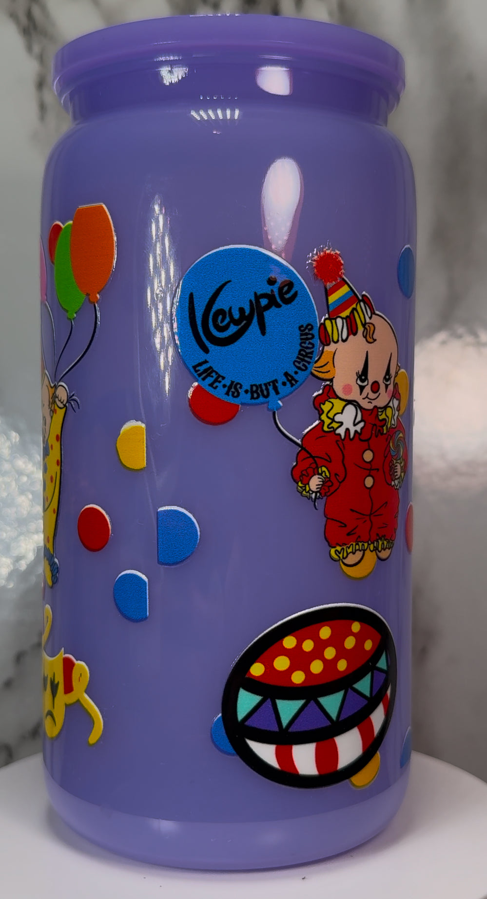 Classic Vintage Circus Clowns UVDTF on a plastic purple cup