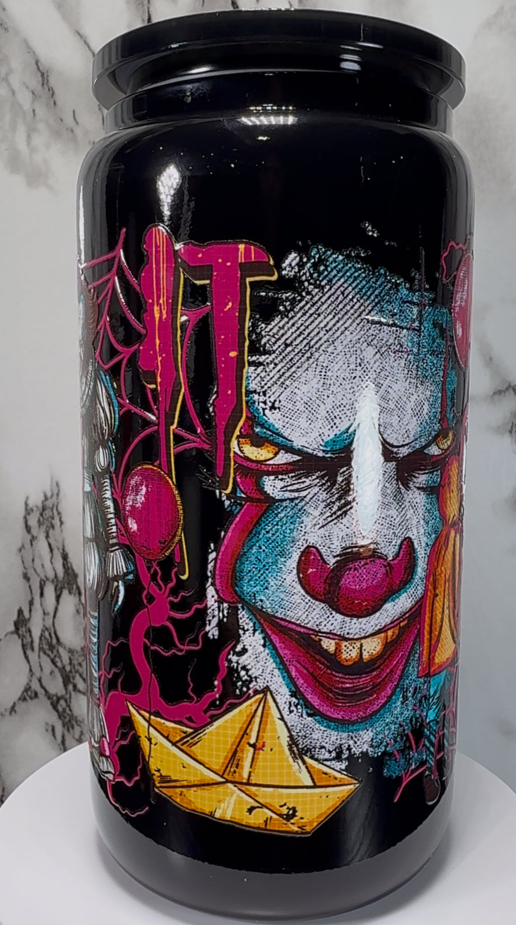 It Pennywise UVDTF on a black beer can glass