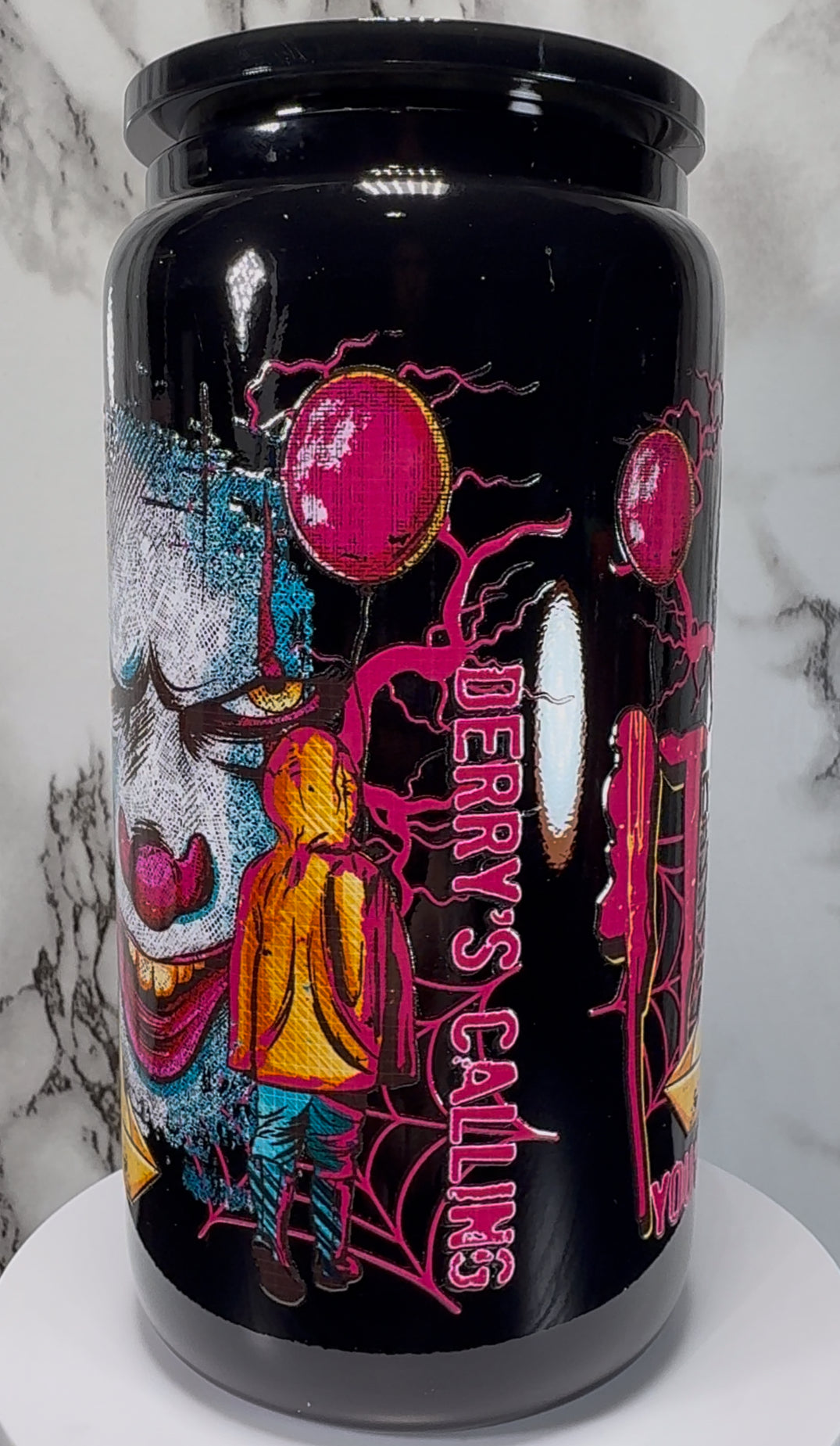 It Pennywise UVDTF on a black beer can glass