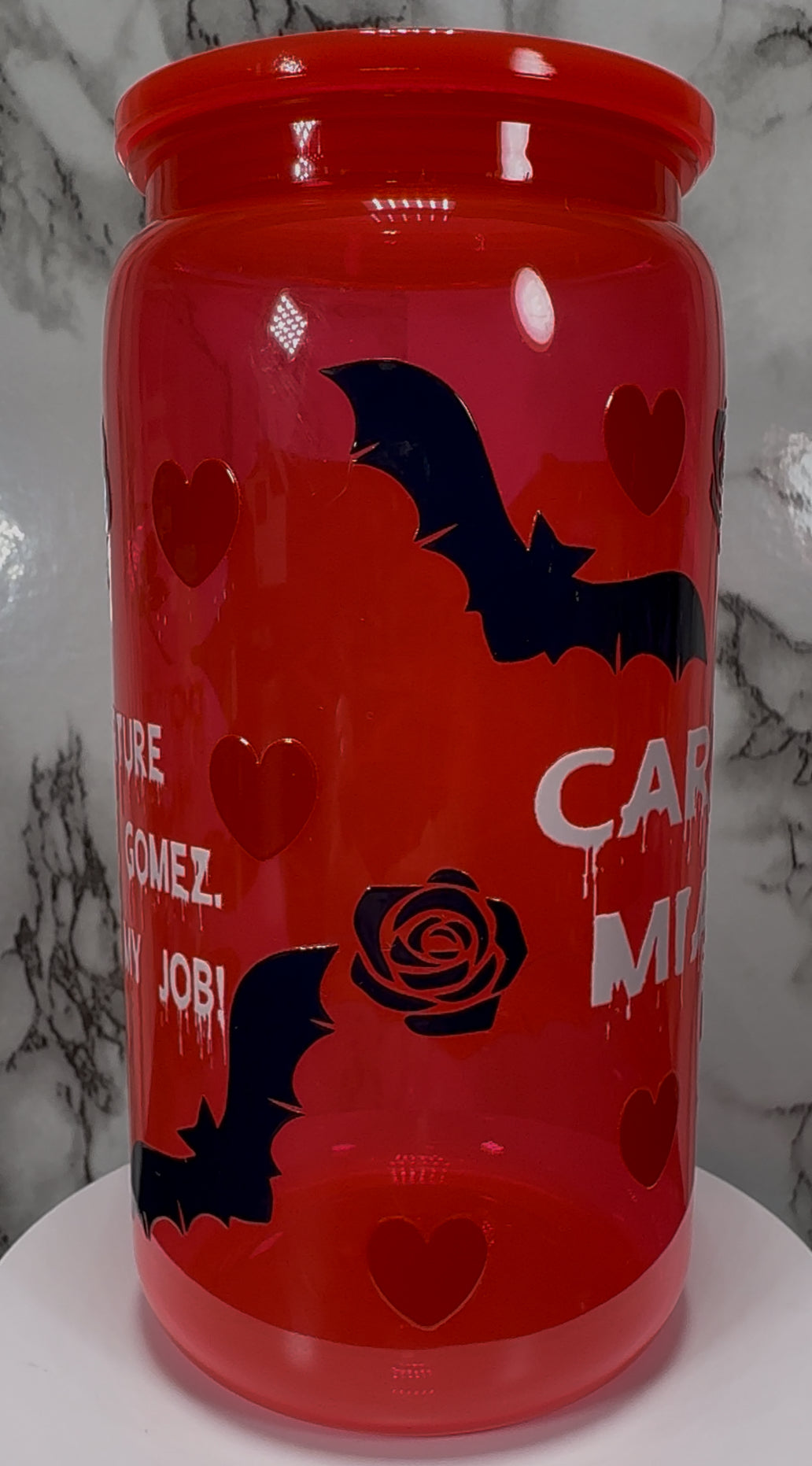 Gomez and Morticia Addams from Addams Family UVDTF on a bright red PLASTIC beer cancup