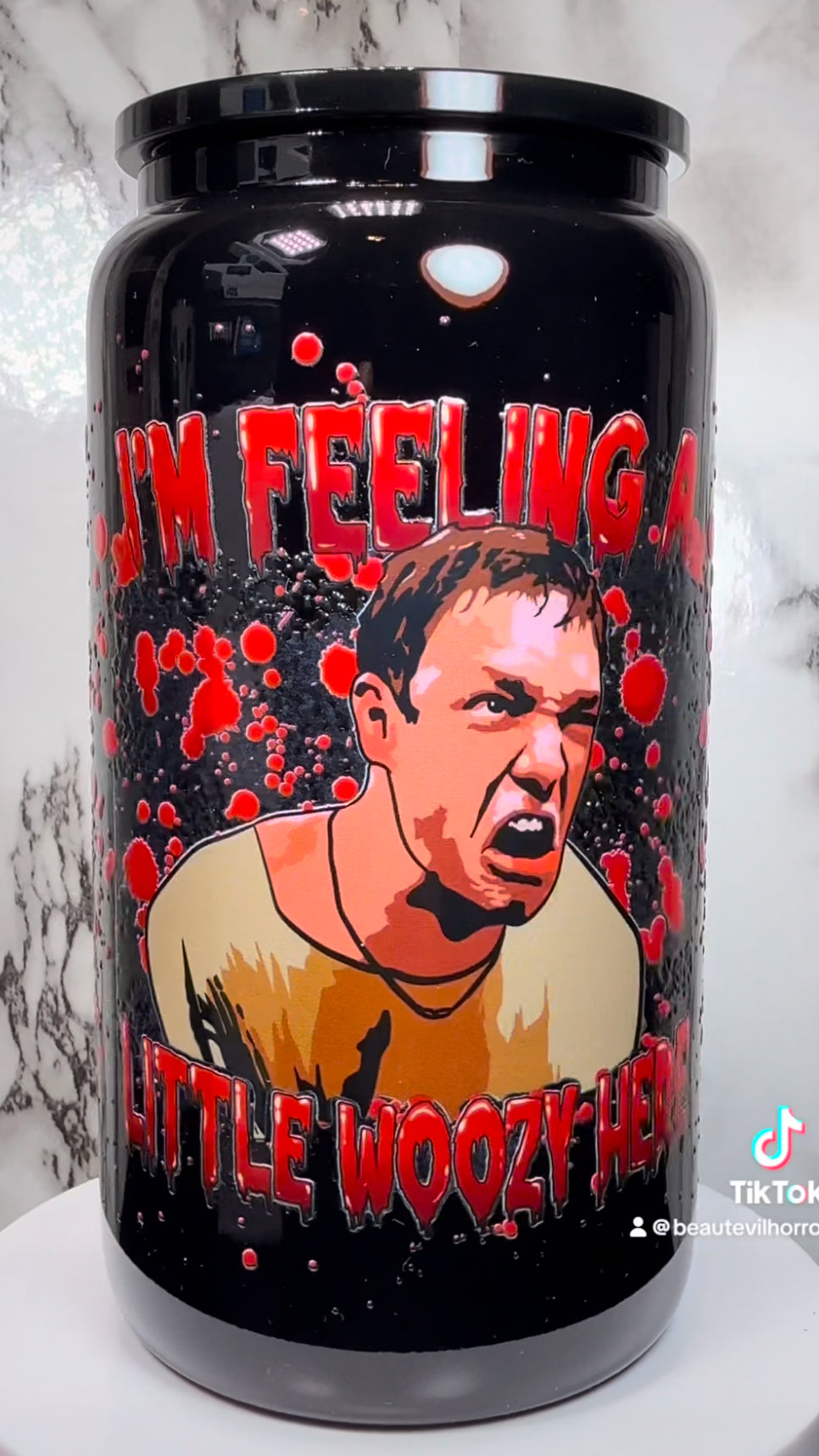 Stu Macher I’m Feeling Woozy Here UVDTF on a black beer can glass