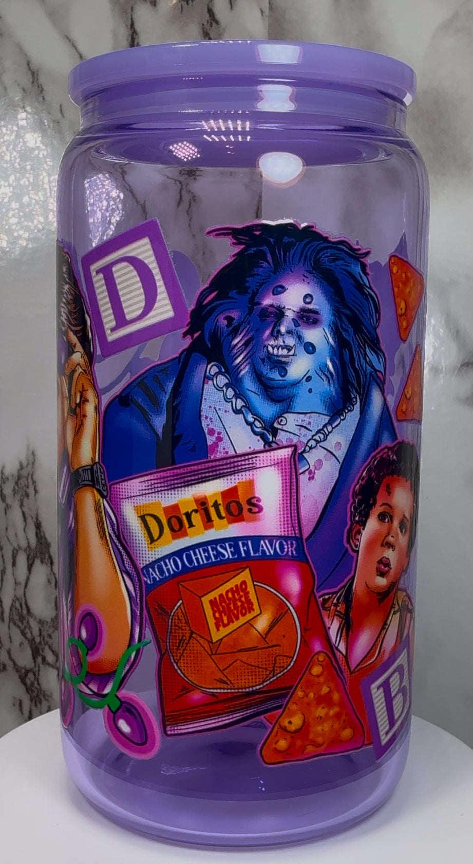 Little Monsters UVDTF on a purple beer can glass
