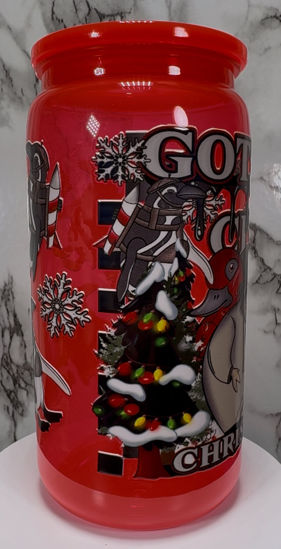Gotham City Penguin UVDTF on a bright red PLASTIC beer can cup