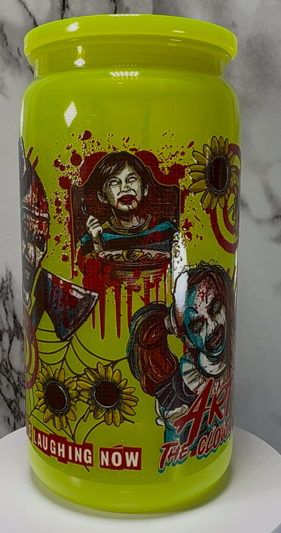 Terrifier UVDTF on a bright yellow PLASTIC beer can cup